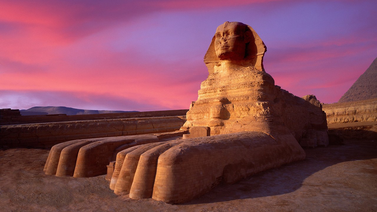 Giza, Egypt --- Twilight at Sphinx --- Image by © Jim Zuckerman/Corbis